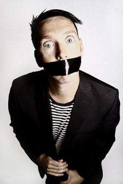 The Boy With Tape On His Face